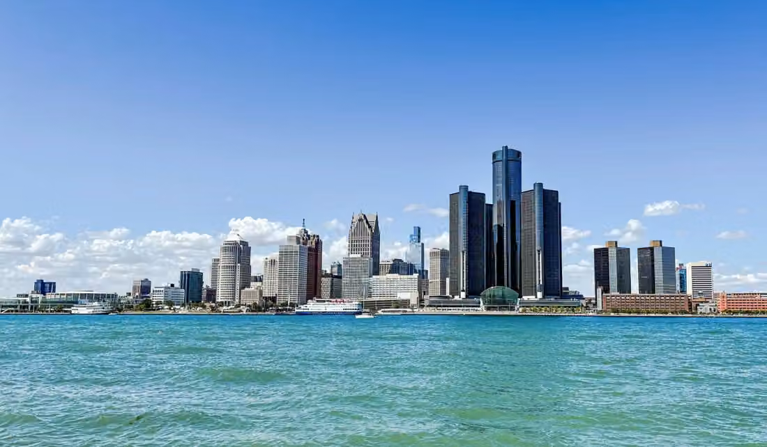 View the city skyline through Detroit River; September 2025